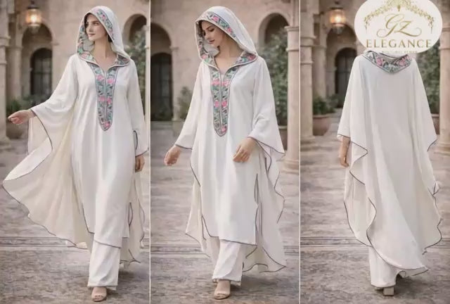 Tunique ivoire brodée main vue détail floral — haute couture marocaine GZ Elegance
